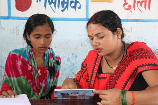 Dhanmati, volunteer big sister with her little sister